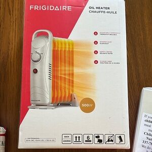 Frigidaire White and Red Oil Heater